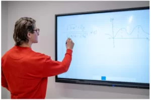 Is an interactive whiteboard the same as a projector