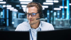 Helpdesk operator providing AV support for clients